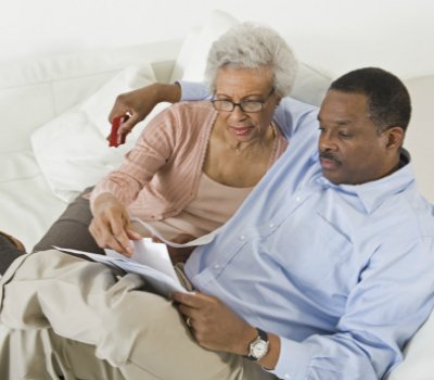 Couple Reading Paperwork